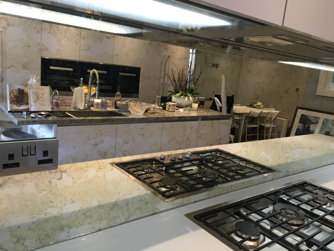 Mirror glass splashback in Hanwell luxury kitchen